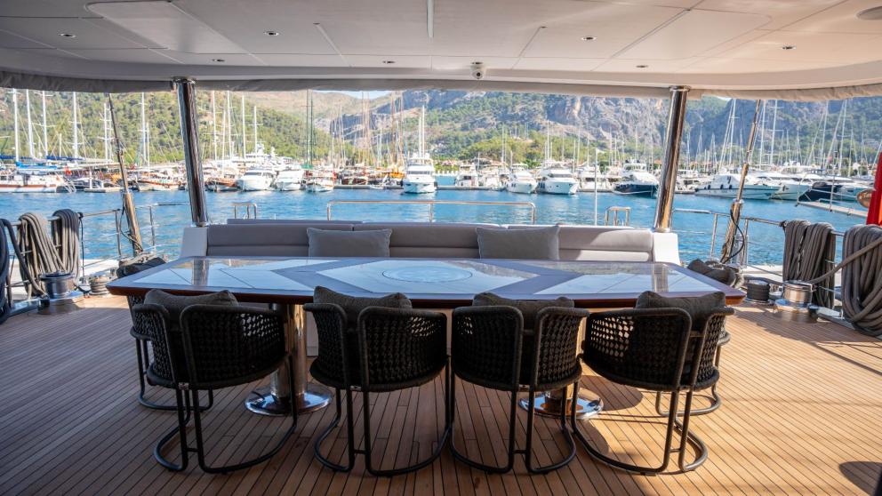 Dining and seating area on the aft deck of luxury yacht North Wind