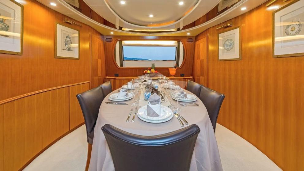 Salon dining table on motor yacht Illya F