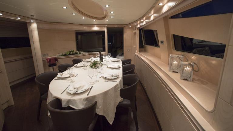 Salon dining area of luxury motor yacht Princess L