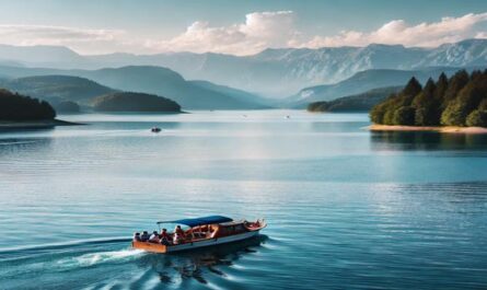 A small group of people enjoying a peaceful boat tour on calm blue waters, surrounded by scenic landscapes, perfect for a serene outin