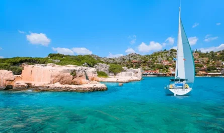 Explore Kekova Bay on a sailboat surrounded by turquoise waters