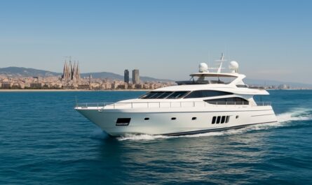 A sleek motor yacht cruises off Barcelona with coastal city views, offering a unique perspective of Catalonia from the sea
