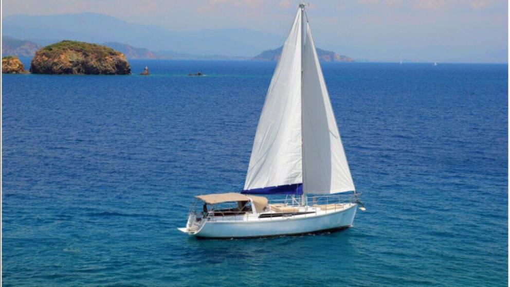 Sailing yacht Famozo makes a tour in Göcek. You can see a magnificent panorama