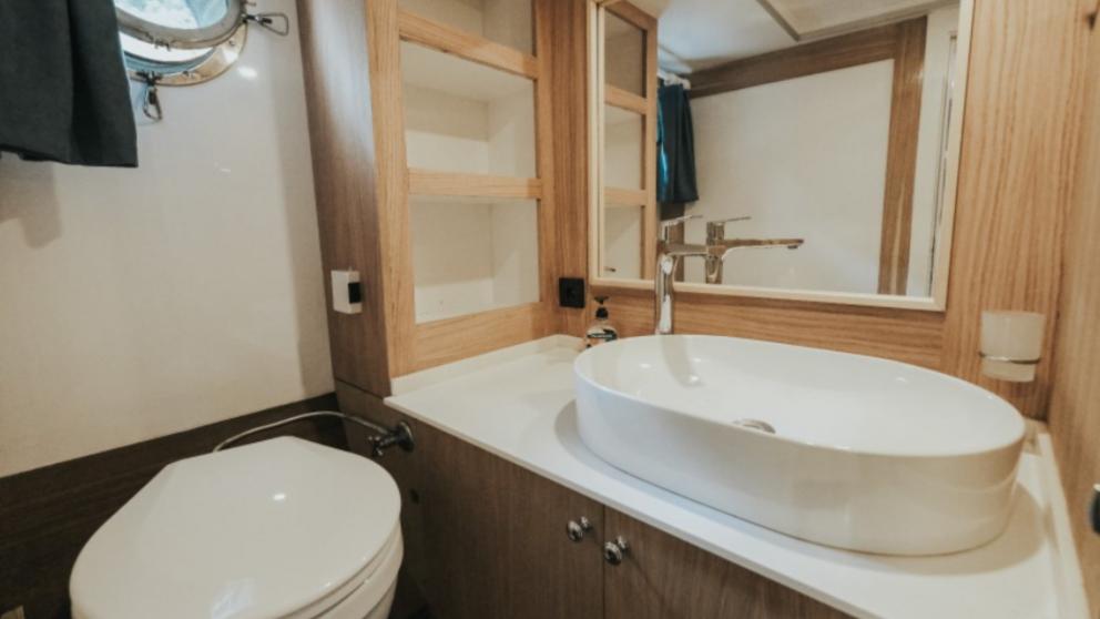 Bathroom with toilet and sink on the yacht