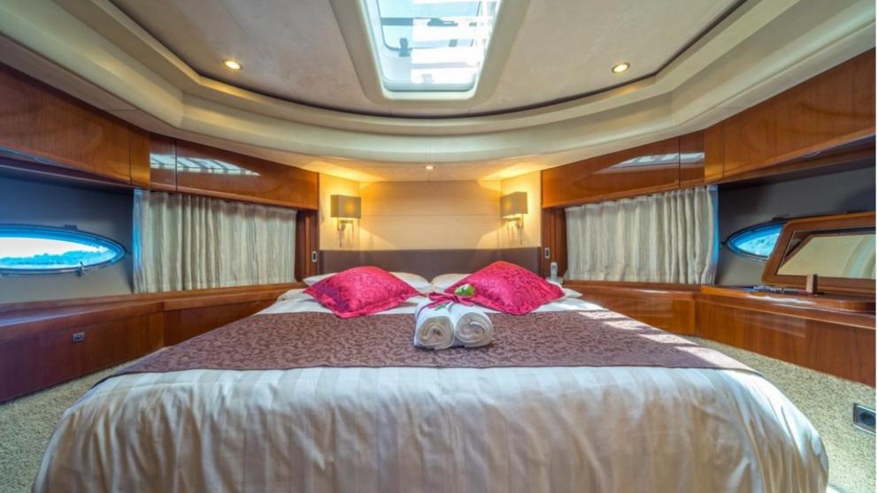 King size bed in a luxury bedroom on a yacht