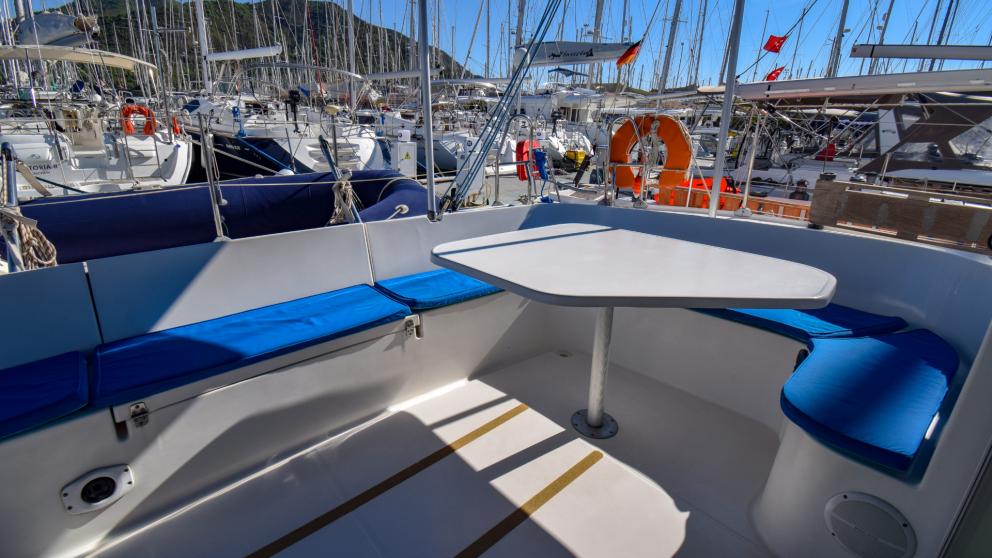 A place to rest and dine on the stern of the rented catamaran Andromeda