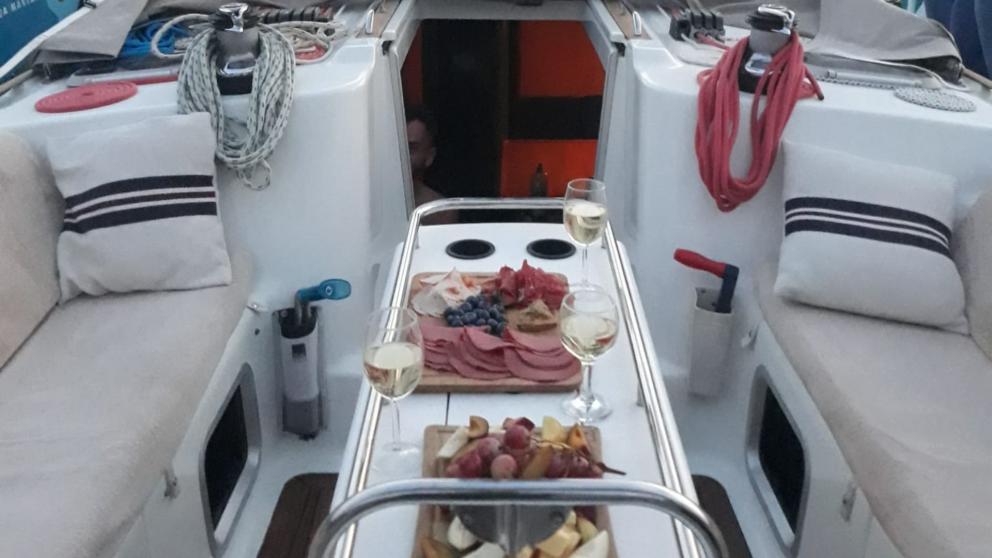 Dining table on the aft deck of the sailing yacht Conformista picture 2