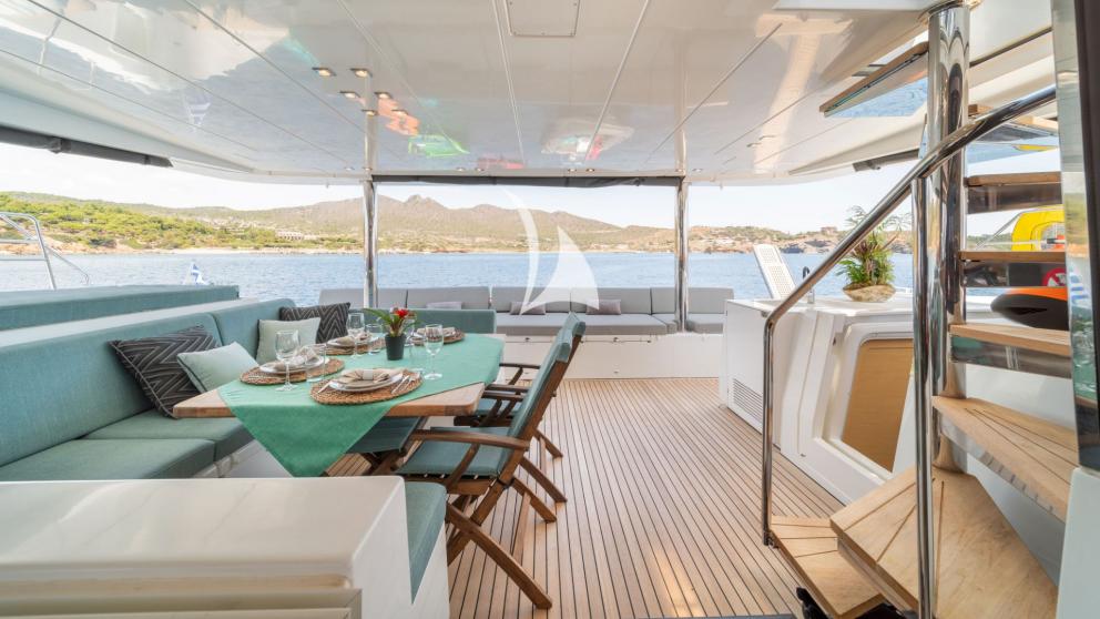 Catamaran For Sail aft deck dining and seating area image 2