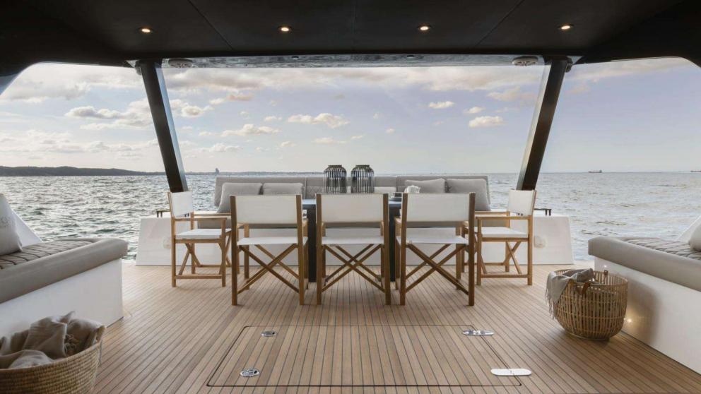 Dining and seating area on the aft deck of the luxury catamaran Moonlight
