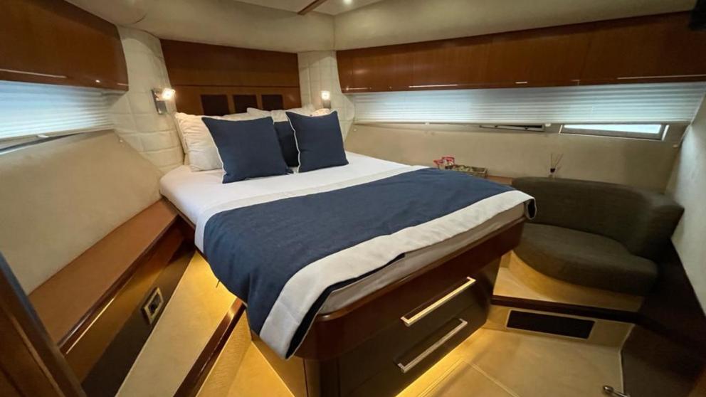 The comfortable bedroom of the luxury motor yacht Melissa My Angel in Göcek features a cozy bed and stylish design.