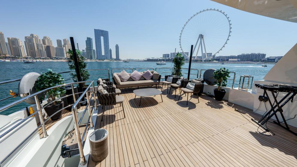 The spacious deck of Tatii 2 with iconic Dubai views