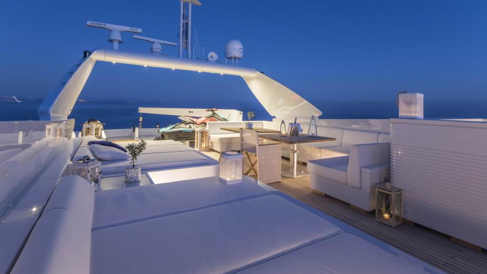 Atmospheric sun deck at night on the Sole Di Mare yacht in Greece.