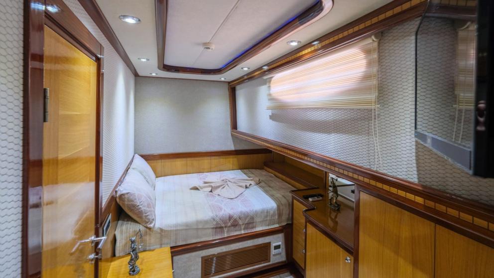 Inviting cabin with a double bed and stylish interior on the gulet.