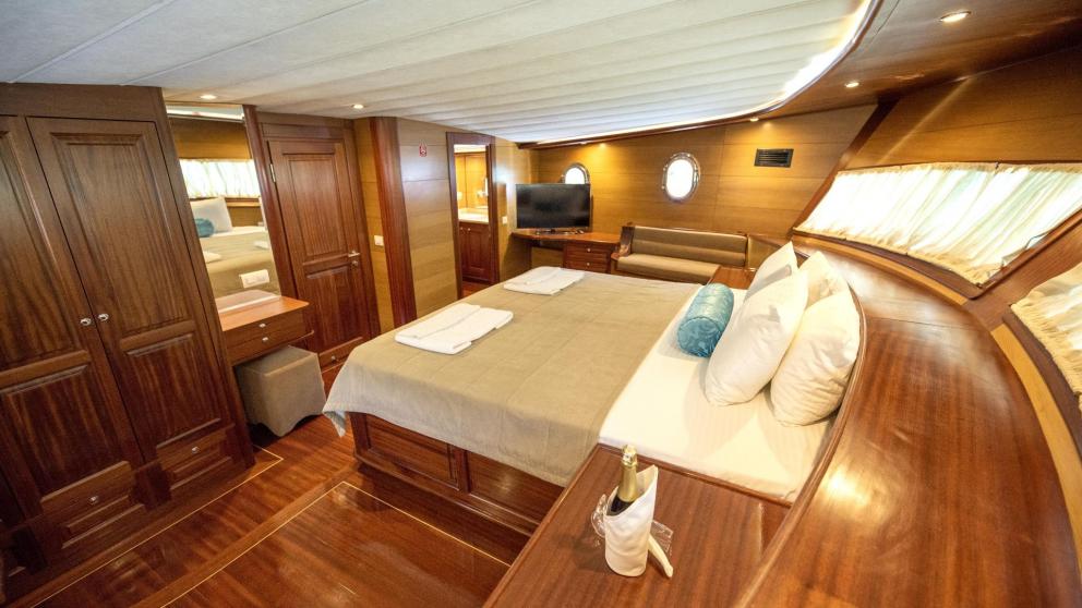 Luxurious and spacious master cabin of a traditional Turkish gulet with five cabins.