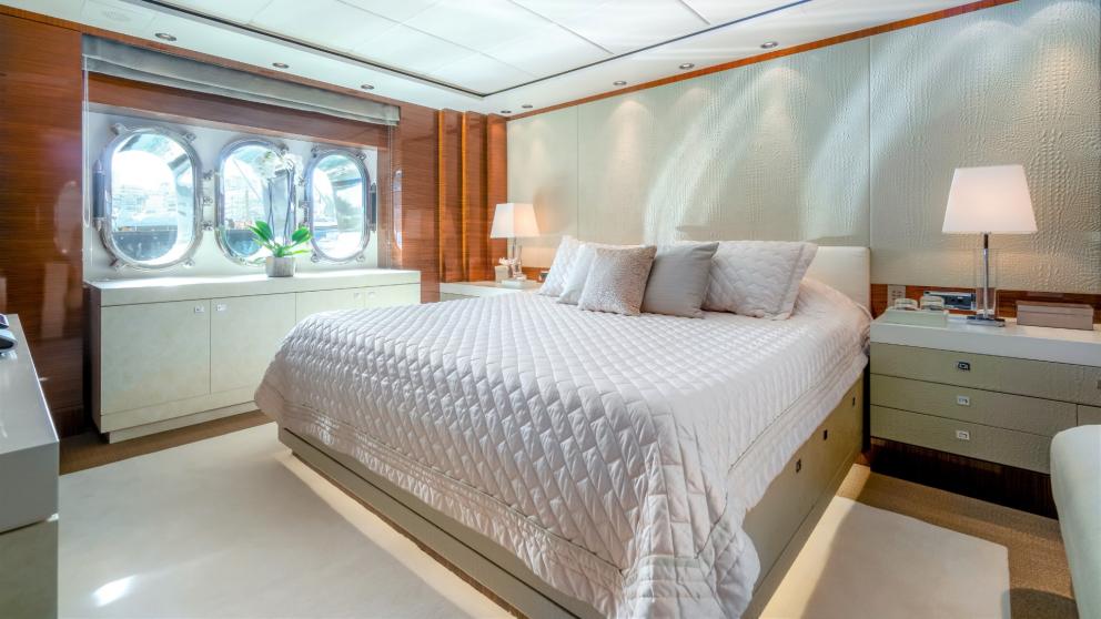 Enjoy the elegant master cabin of the motor yacht O'Pati for restful nights at sea.