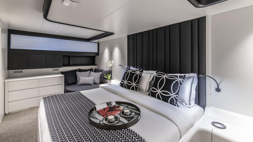 Elegant and comfortable cabin on Project Steel with stylish decor and cozy bed.