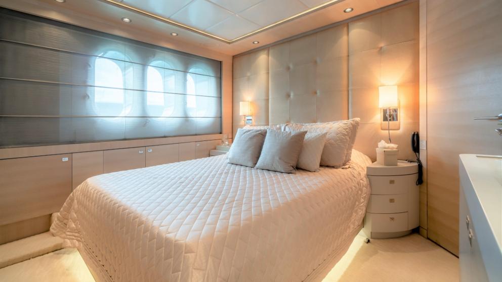 Enjoy the comfortable guest cabin of the luxurious motor yacht O'Pati for restful nights at sea.
