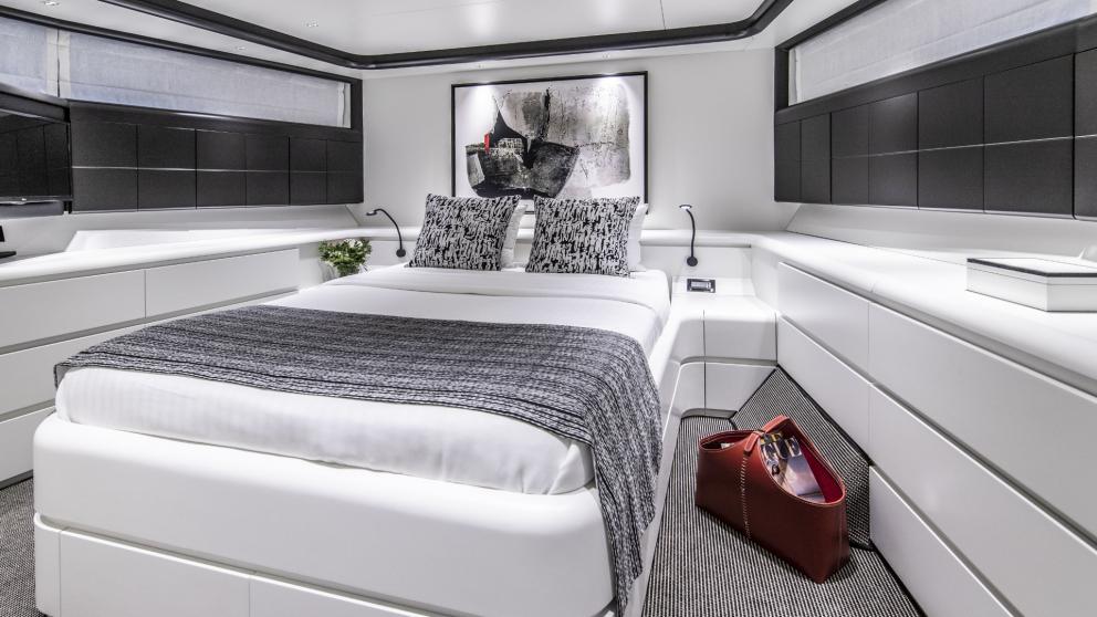 Luxurious guest cabin of Project Steel with stylish decor and comfortable bed.