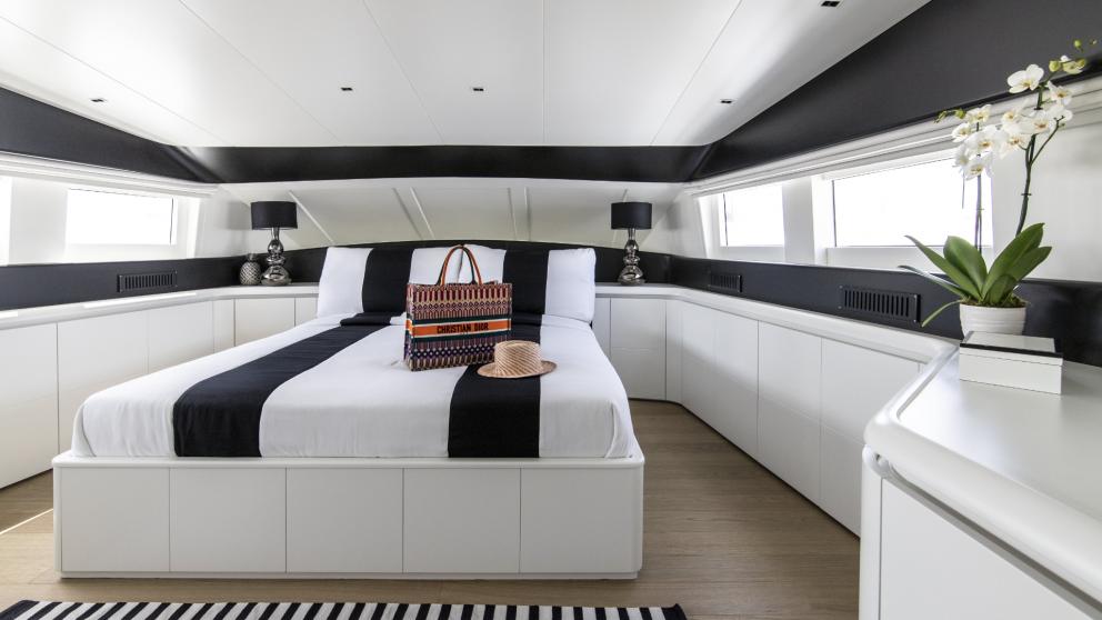 Spacious and luxurious master cabin of Project Steel with modern design and ample daylight.