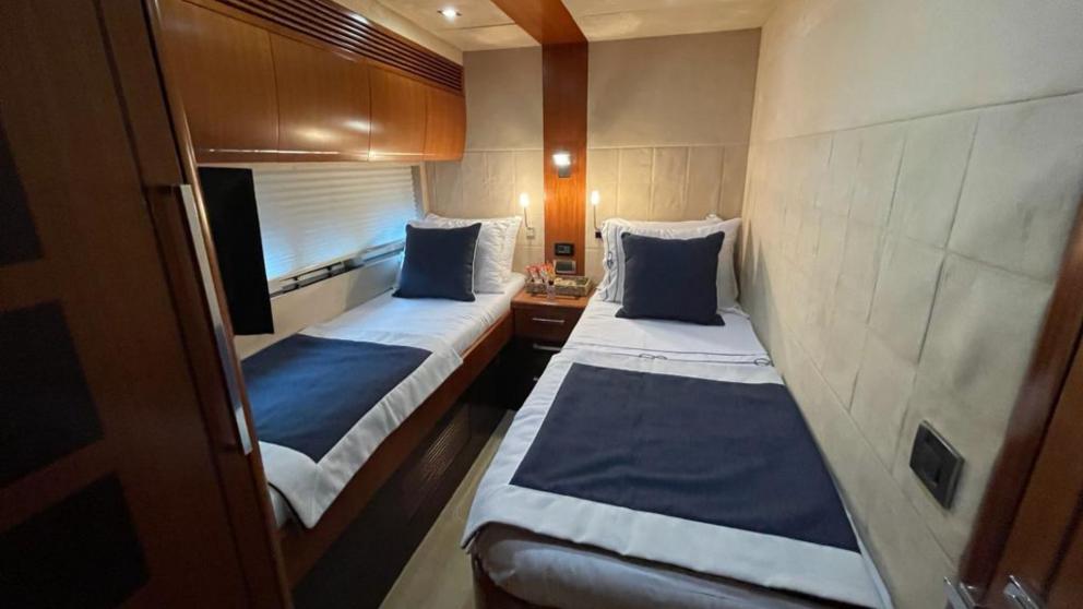 The twin bedroom of the luxury motor yacht Melissa My Angel in Göcek features a comfortable and stylish design.