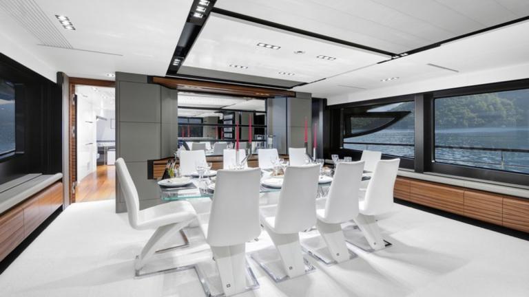 The meeting room of a luxury yacht designed with the harmony of futurism and minimalism.