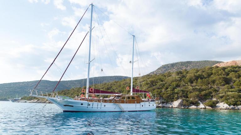 Luxurious gulet Primadonna in a bay in the azure sea