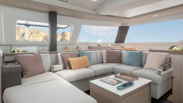 Soft sofa in the living room of the catamaran