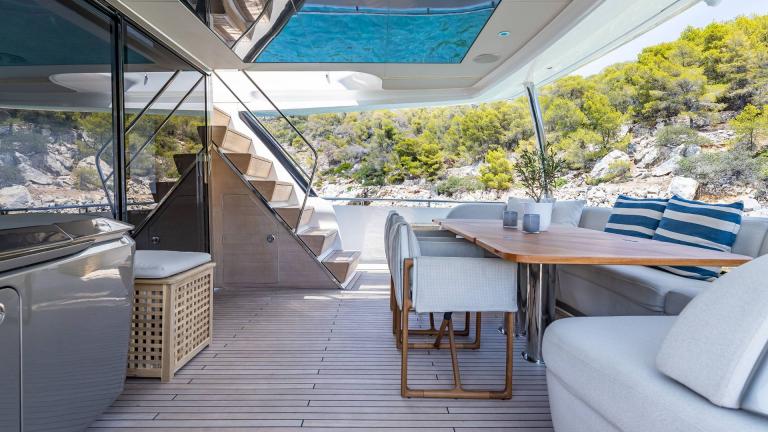 Stylish outdoor area on a yacht with direct access to nature.