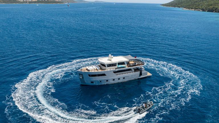 Exterior view of trawler motor yacht Calm Down image 1