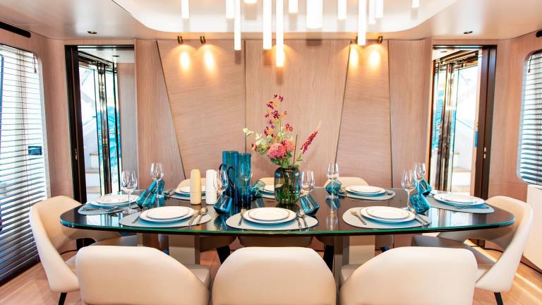 Stylishly set dining room of the 27-meter motor yacht Dawo in Sibenik, perfect for luxurious meals.