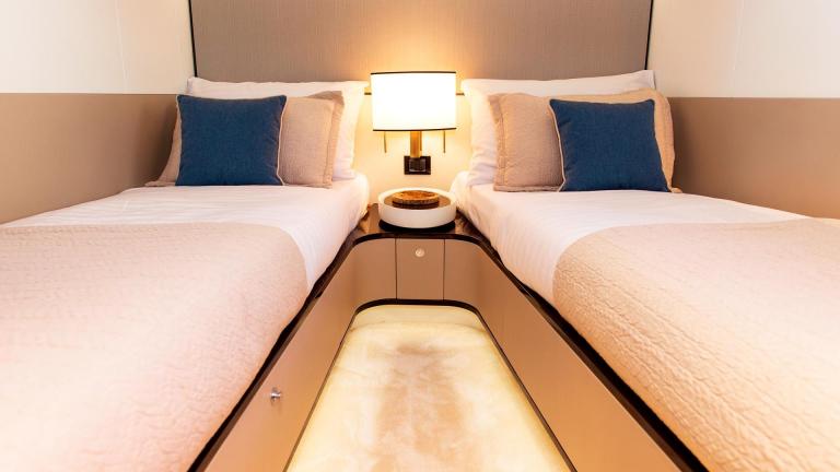 Comfortable twin bed cabin of the 27-meter motor yacht Dawo in Sibenik, ideal for guests.