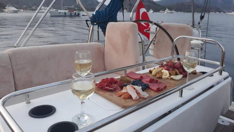Dining table on the aft deck of the sailing yacht Conformista picture 1