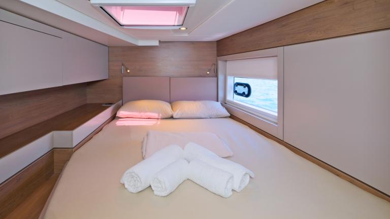 The catamaran's white bedroom ensures that your eyes are comfortable when you are inside.