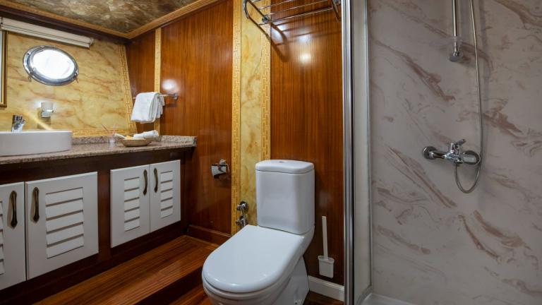 Modern bathroom with shower on the Grand Acar Gulet in Fethiye.
