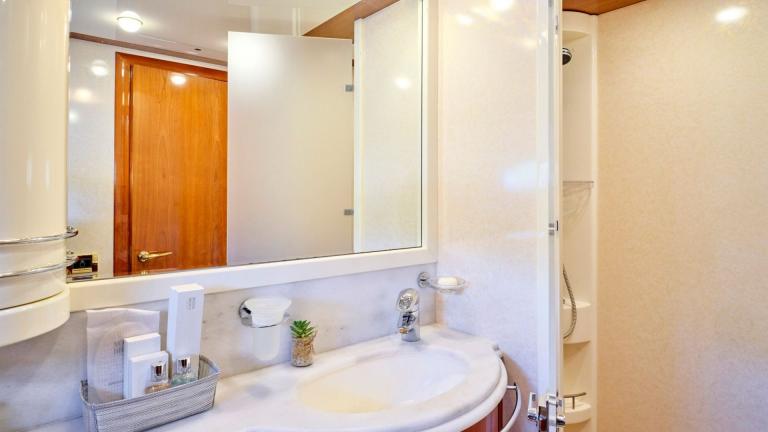 Luxurious bathroom on a yacht with modern fixtures and elegant amenities