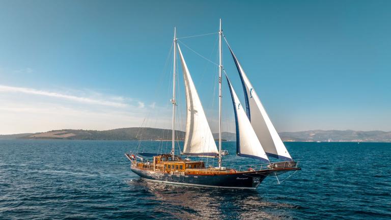 The gulet Smart Spirit, an elegant sailing ship with four cabins, sails on the sea off the coast of Croatia.