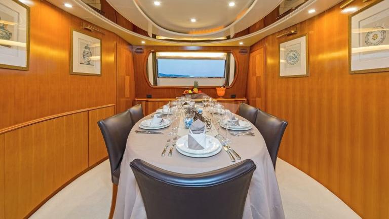 Salon dining table on motor yacht Illya F