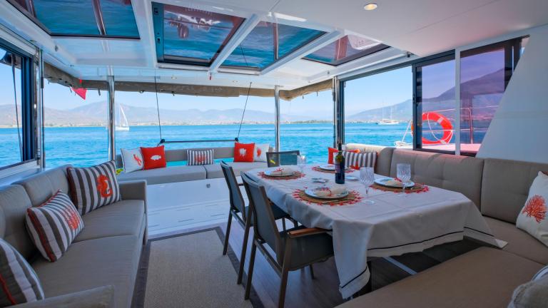 The stylish interior of the catamaran offers passengers the opportunity to relax during the trip.