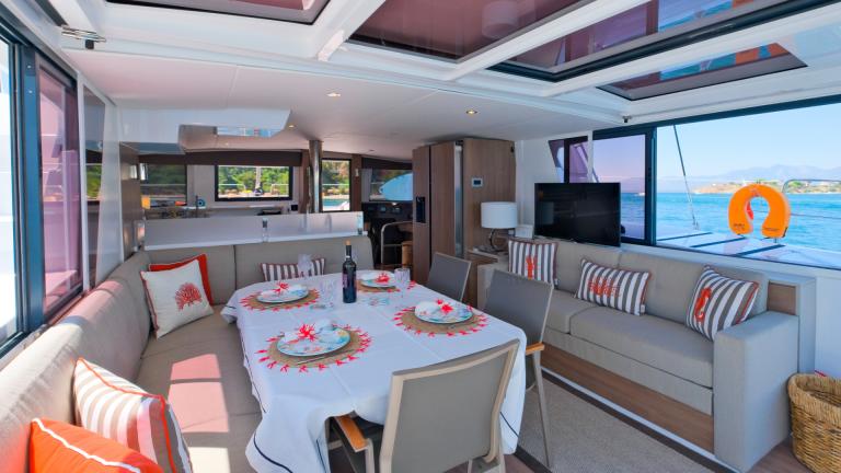 The stylish interior design of the catamaran offers unforgettable dinners in the middle of the sea.