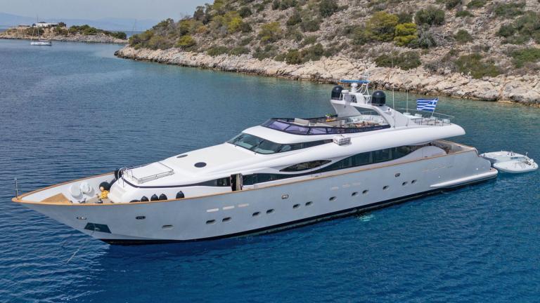 The luxury yacht Pareaki 2 is anchored in clear waters near Athens, perfect for summer cruising.