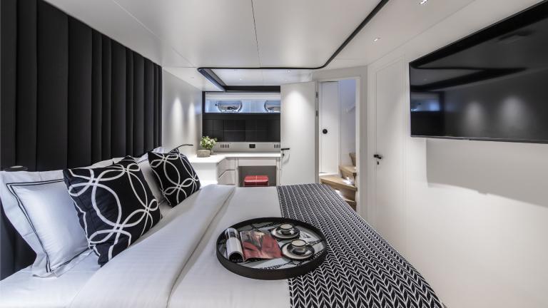 Comfortable cabin of Project Steel with stylish decor and modern entertainment system.