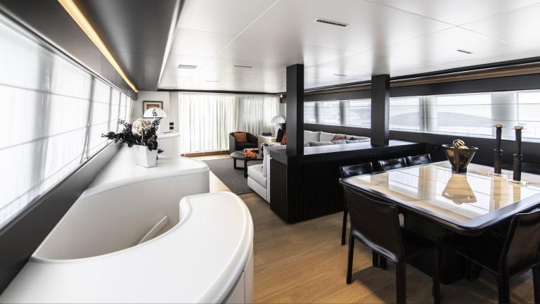 Elegant dining area and cozy living space on Project Steel, perfect for stylish evenings onboard.