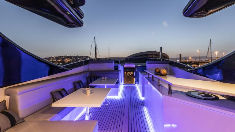 Night view of the stylish upper deck of Project Steel with ambient lighting.