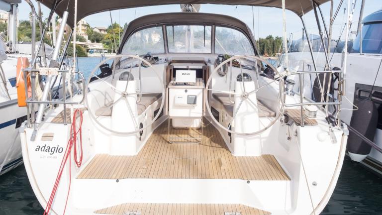 The aft cockpit of sailing yacht Adagio docked in the marina.