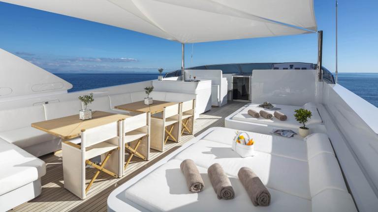 Comfortable sun deck with shaded area on the Sole Di Mare in Greece.