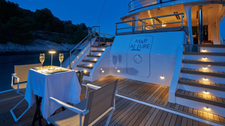 Dinner on the bathing platform of the luxury sailing yacht MarAllure