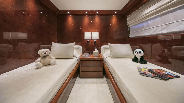 Comfortable twin bed cabin for children or guests on the Sole Di Mare yacht.
