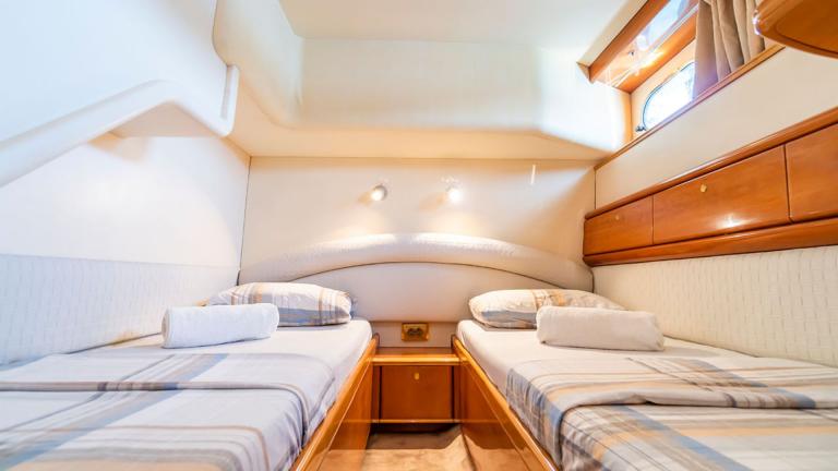 Twin guest cabins on the motor yacht Queen Of Angel.
