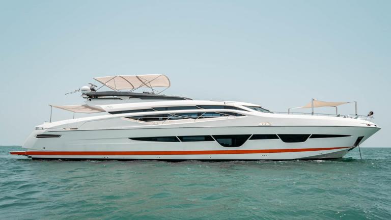 The yacht Dolce Vita is anchored at sea, standing out with its elegant design.