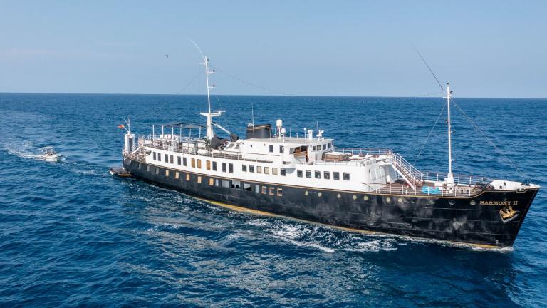 The Harmony II motor yacht cruising elegantly across the open sea.